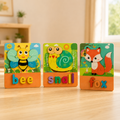 Pack Amigos do Jardim: 3 puzzles de madeira com abelha, caracol e raposa, numa mesa