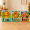 Pack Amigos da Selva: 3 puzzles de madeira com leão, tigre e táxi, numa mesa